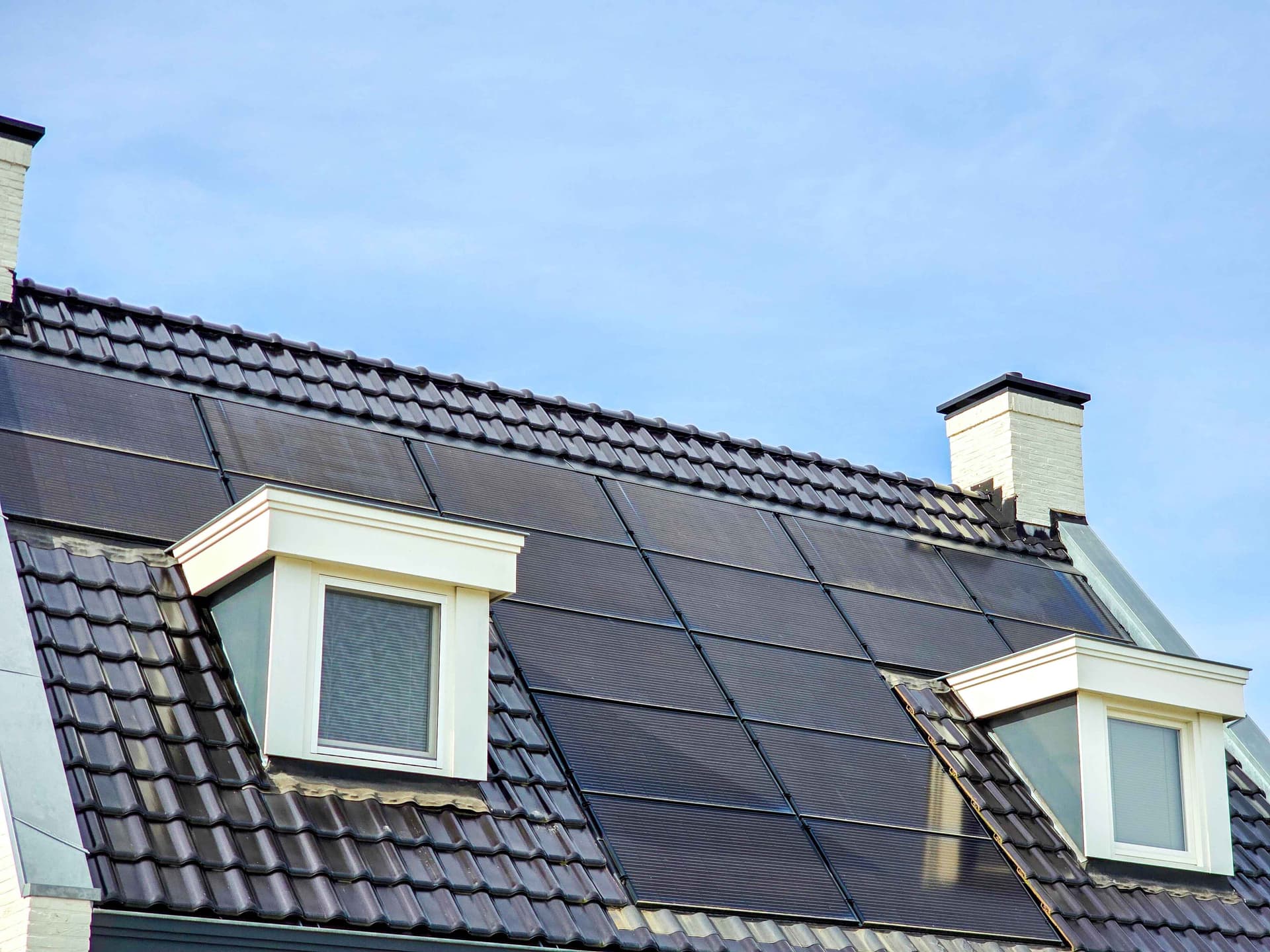 newly-build-houses-with-solar-panels-attached,jpg